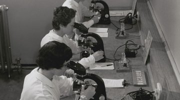 Skilled technicians study slides of cells in body fluids, looking for abnormalities suggestive of cancer at the Royal Womens Hospital, Melbourne