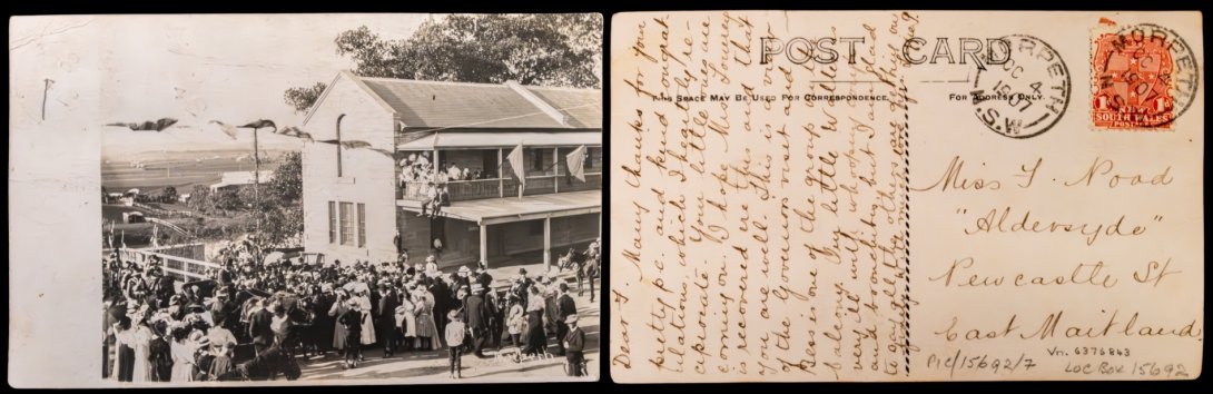 Front and back of an old postcard. On the front is a black and white photo of crowds gathered around a building. On the back is a long message updating the recipient about the health of the sender's young family members.