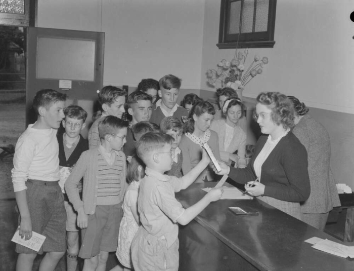 A group of children and librarian at Waratah branch library, Newcastle, New South Wales, 13 September 1948