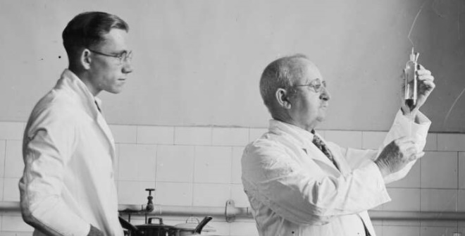 Fairfax Corporation. (1920). Two scientists inspecting a chemical in the Health Department Laboratory, New South Wales, ca. 1920 http://nla.gov.au/nla.obj-157623917