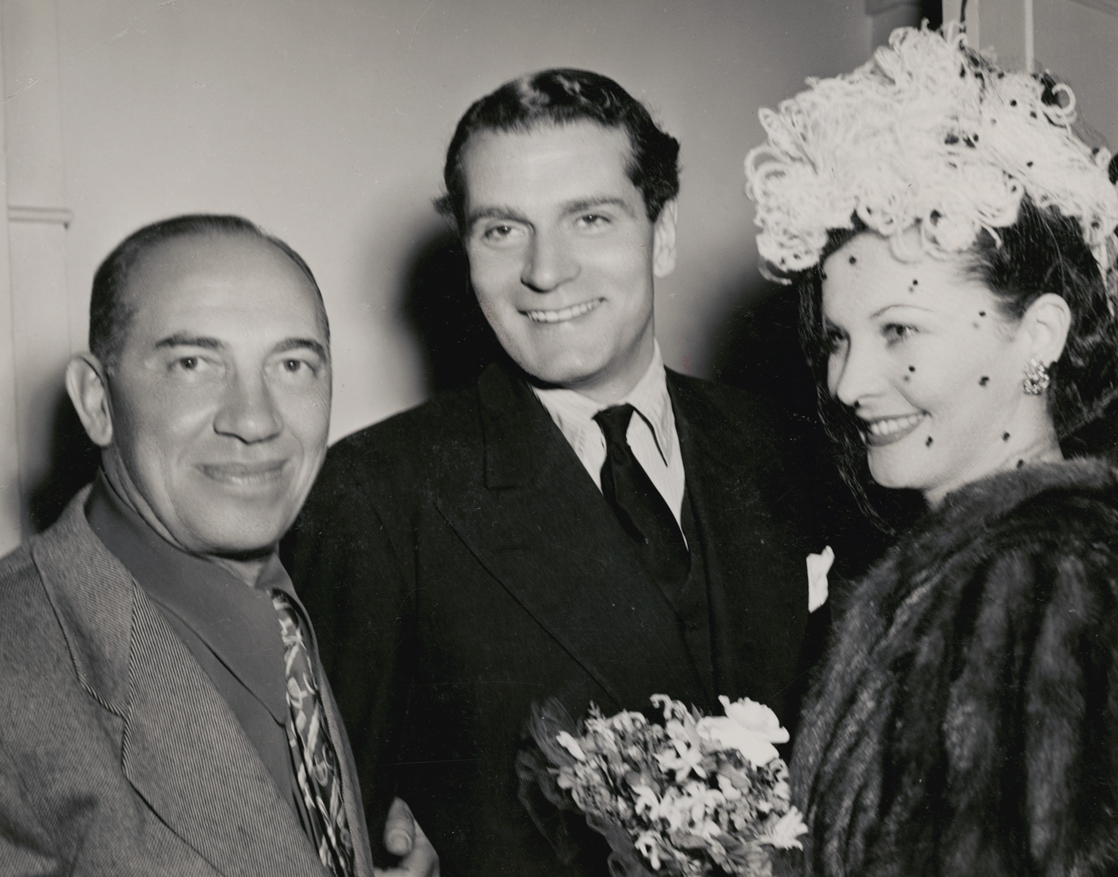 Laurence Olivier (centre) and Vivien Leigh with Chico Marx during their Australasian tour with the Old Vic company, 1948, nla.obj-141832300