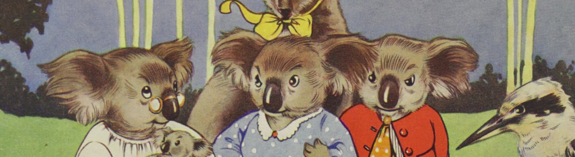 A children's book illustration shows three koalas next to a kookaburra. Trees and grass can be seen in the background