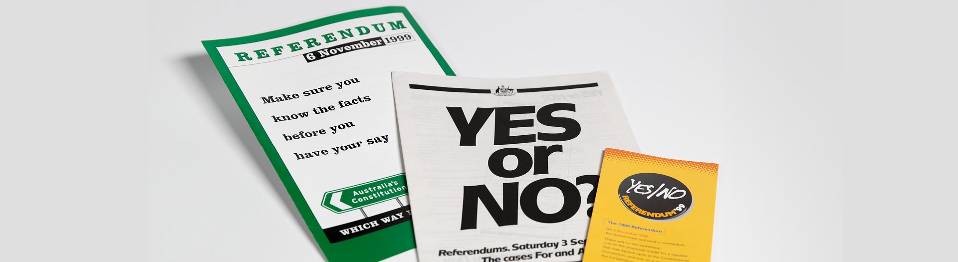 A photo of 3 documents relating to the 2023 referendum on the' Voice'.