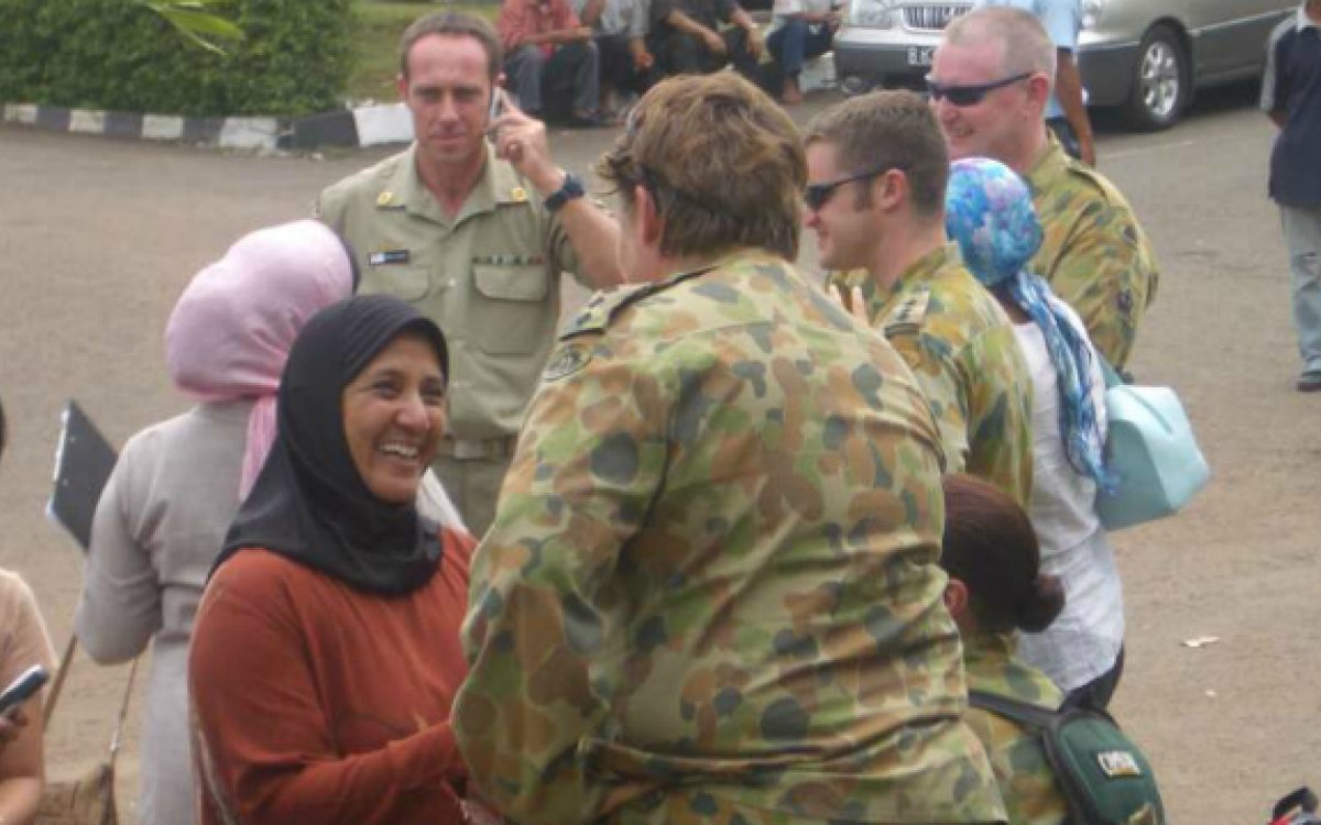 Indonesian women greeting Australian Defence Force personnel during the relief operation in Aceh, Indonesia after the tsunami