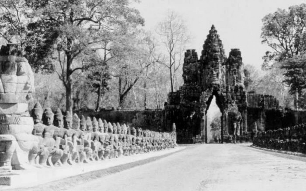 Gates of Angkor Thom, view from southern gate, rows of sculptures line entrance gate