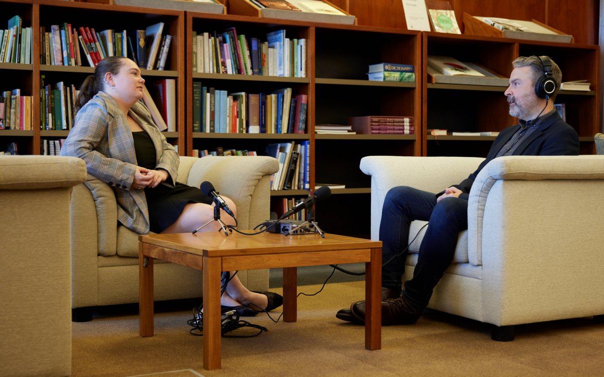 A National Library oral historian conducting an interview with a young woman