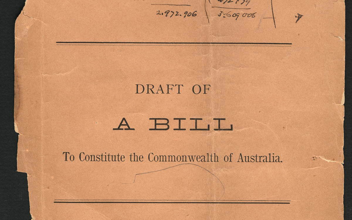 A torn buff coloured page with the words 'Draft of A Bill to Constitute the Commonwealth of Australia', with handwritten notes at the top and bottom of the page..