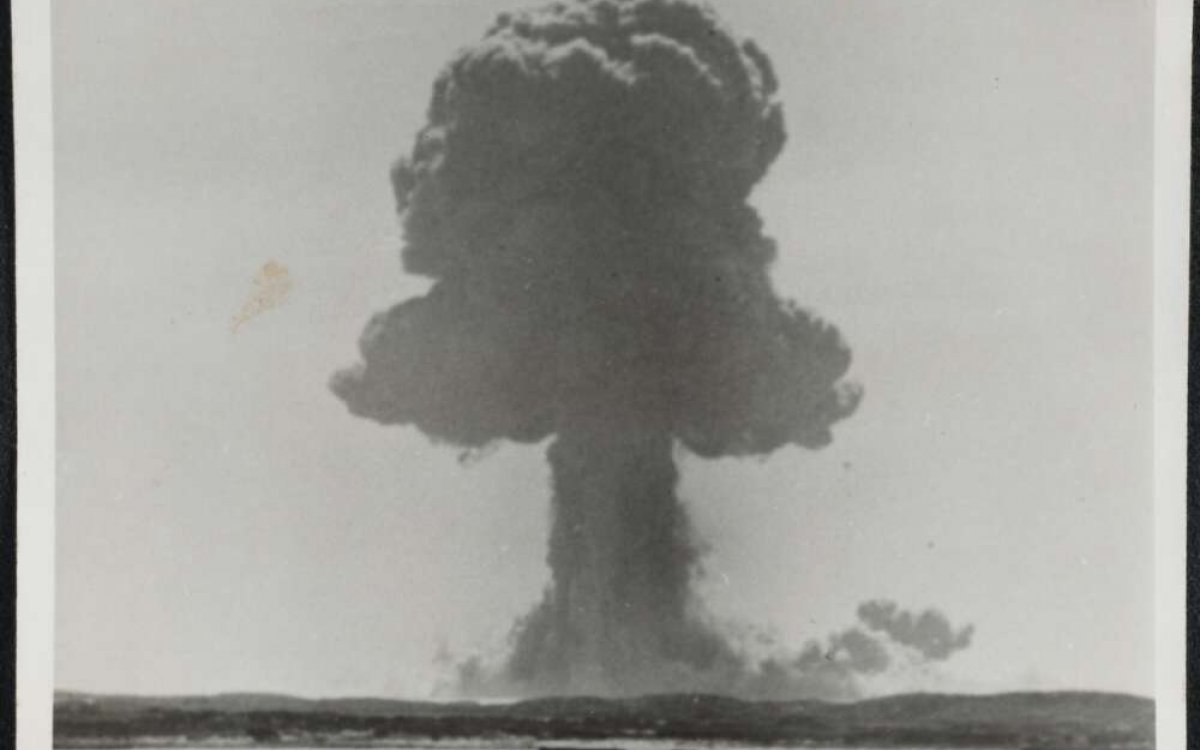 black and white photograph of the mushroom cloud from a nuclear blast