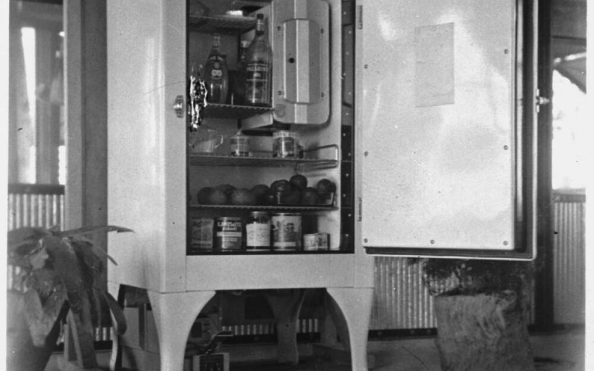 black and white photo of a first aid fridge