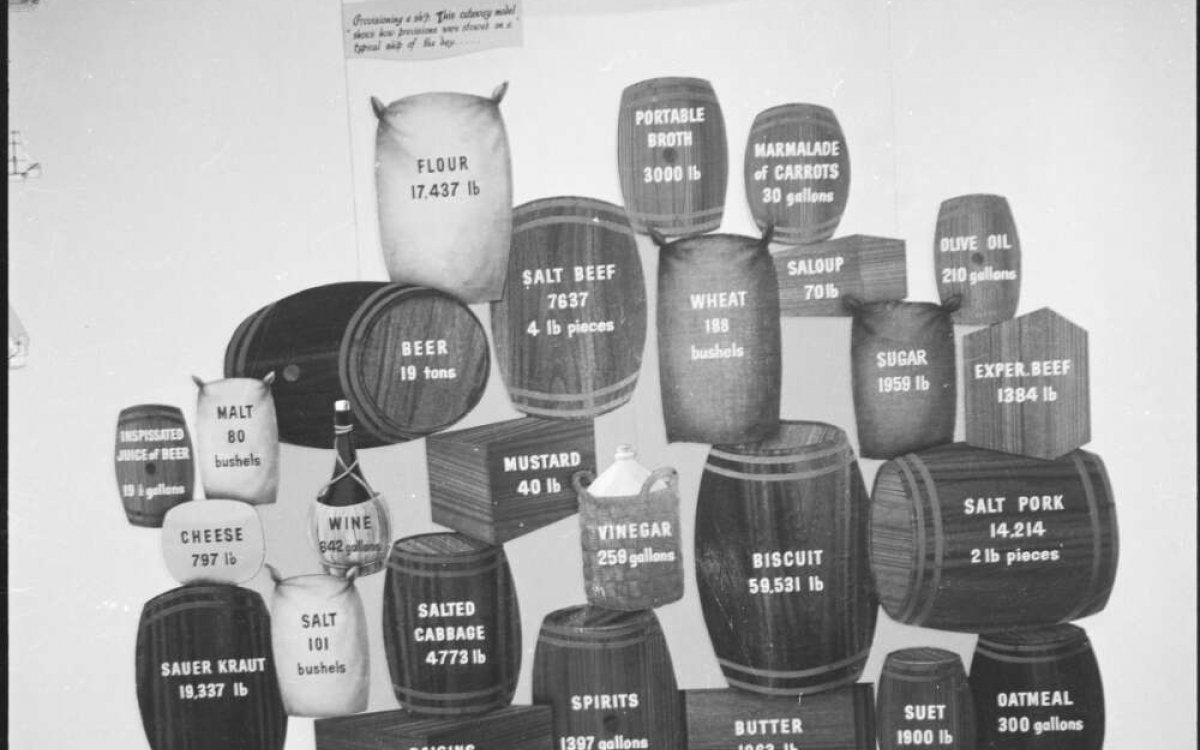 photograph of differently sized barrels labelled with various foodstuffs