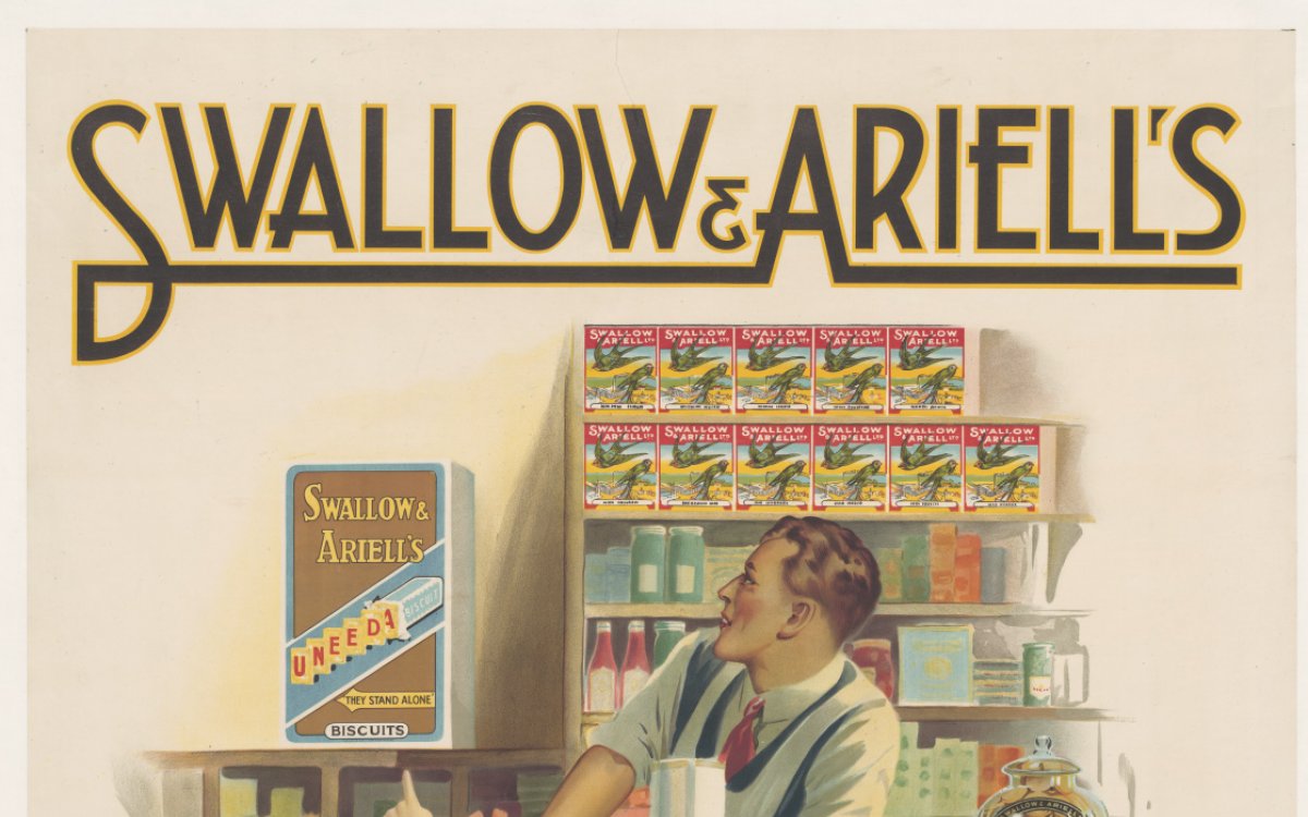 A back view of a little girl in a shop peeping over the counter and pointing to a packet of Swallow & Ariell's Uneeda Biscuit. The oversized basket looped over her right arm has caught the right side of her red dress partially exposing her underpants and suspendered stockings. The man leaning on a counter is looking toward the direction of the packet. Behind him on a shelf are eleven packets of various Swallow & Ariell's products. To the girl's right sits a large cat.