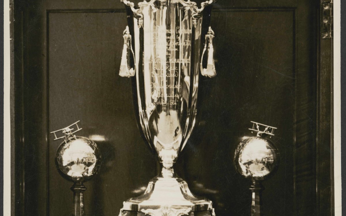 black and white photograph of a silver trophy
