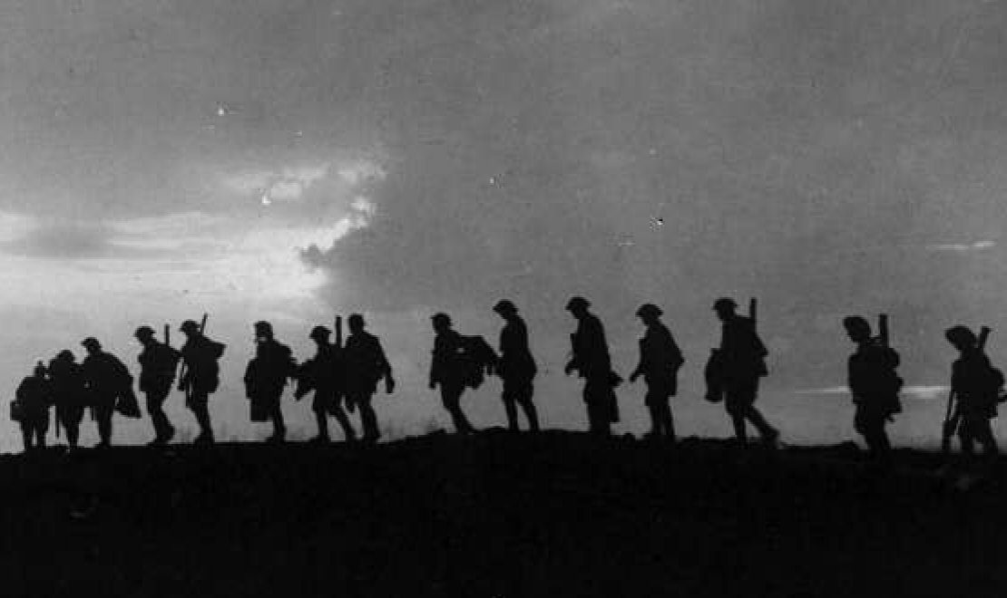 Frank Hurley (1885–1962), Infantry Moving Forward to Take up Front Line Positions at Evening, Their Images Reflected in a Rain-filled Crater at Hooge, October 1917 (detail), nla.cat-vn91190