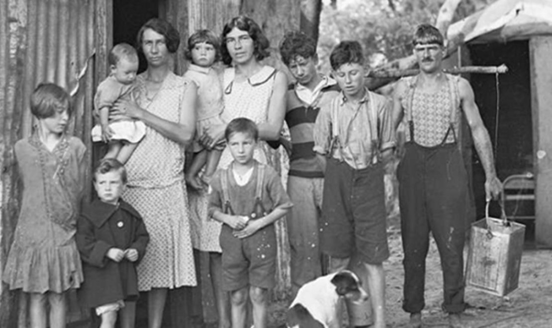 A Family Standing Outside a Tin Shack Called Wiloma during the Great Depression, New South Wales. c. 1932 (detail), nla.cat-vn6247387, courtesy Fairfax Syndication