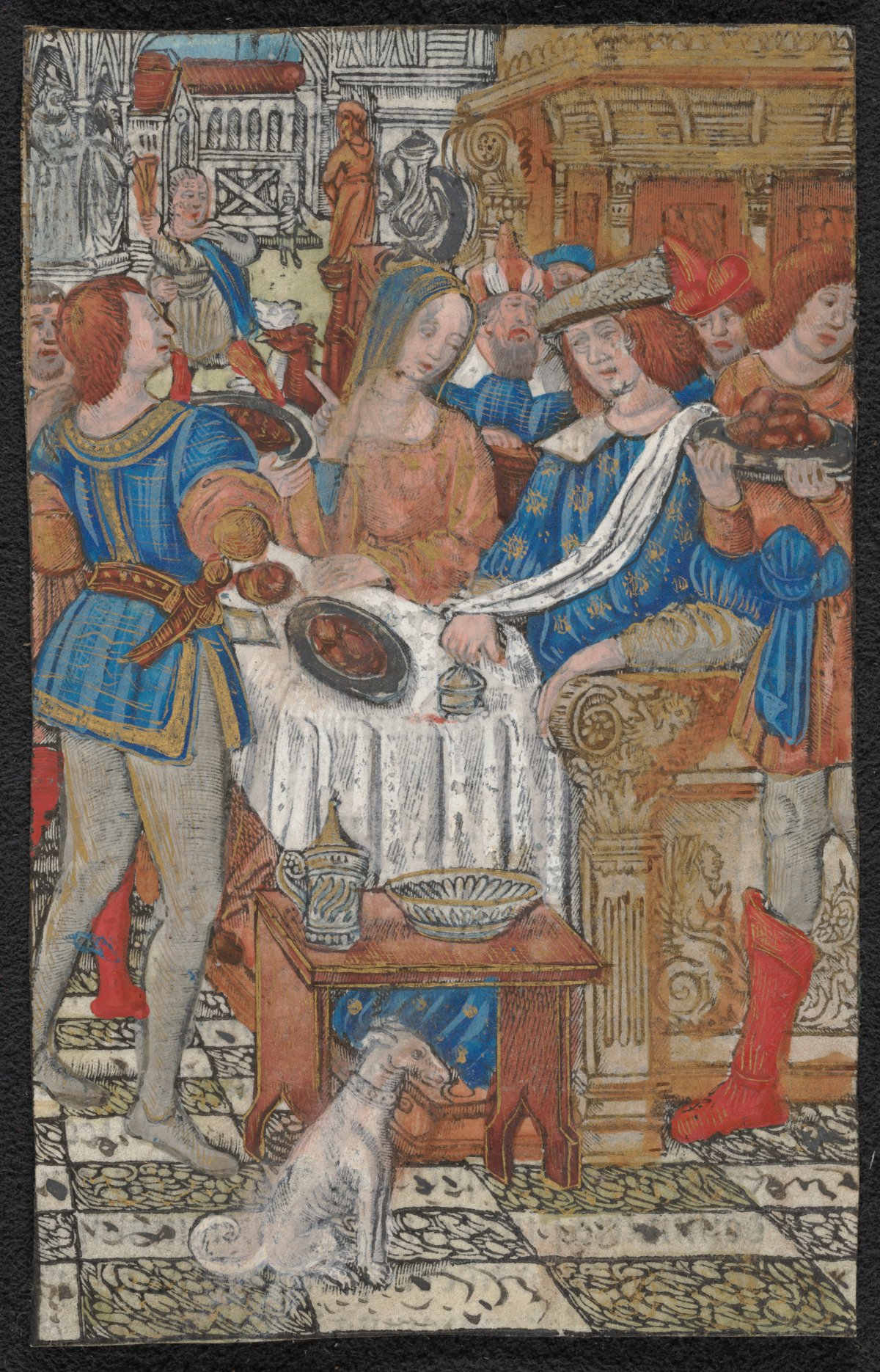A colourful image of a feast. Men and women are dressed in colourful clothes. There is a table with a white tablecloth. There is a plate of food on the table.