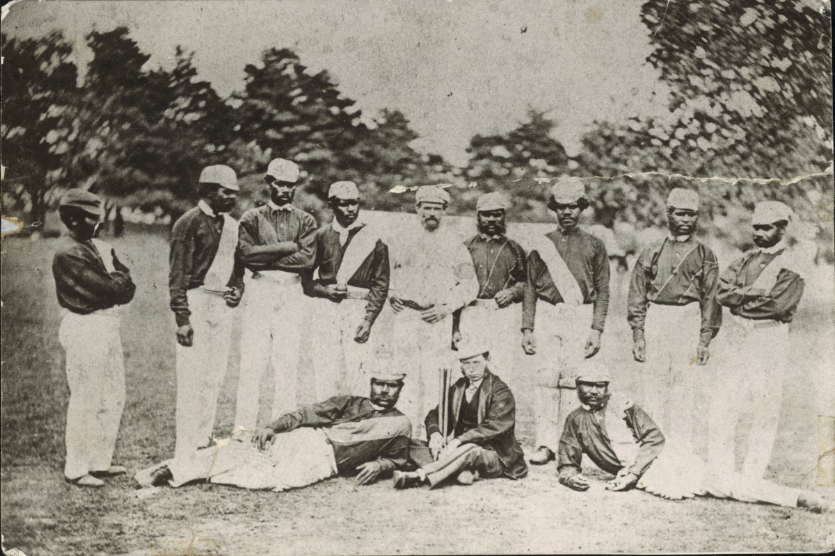Black and white photo of Aboriginal Australian cricketers in 1868 with C. Lawrence & W. Shepherd as Manager and Captain