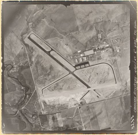 Aerial view of Canberra airstrip and adjacent buildings, 1947.