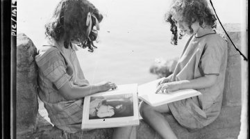 Image of two girls reading