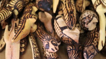 Close up photograph of carved wooden objects