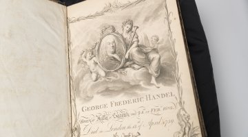 Page of book with image of George Handel on one of the pages.