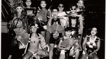 Group of men and women, the Asian Lesbian and Gay Pride Group, in makeup with fans, at Mardi Gras