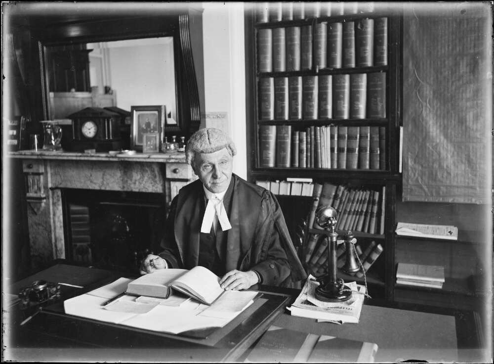 High Court of Australia Justice Isaac Isaacs reading in his office, Sydney, ca. 1930