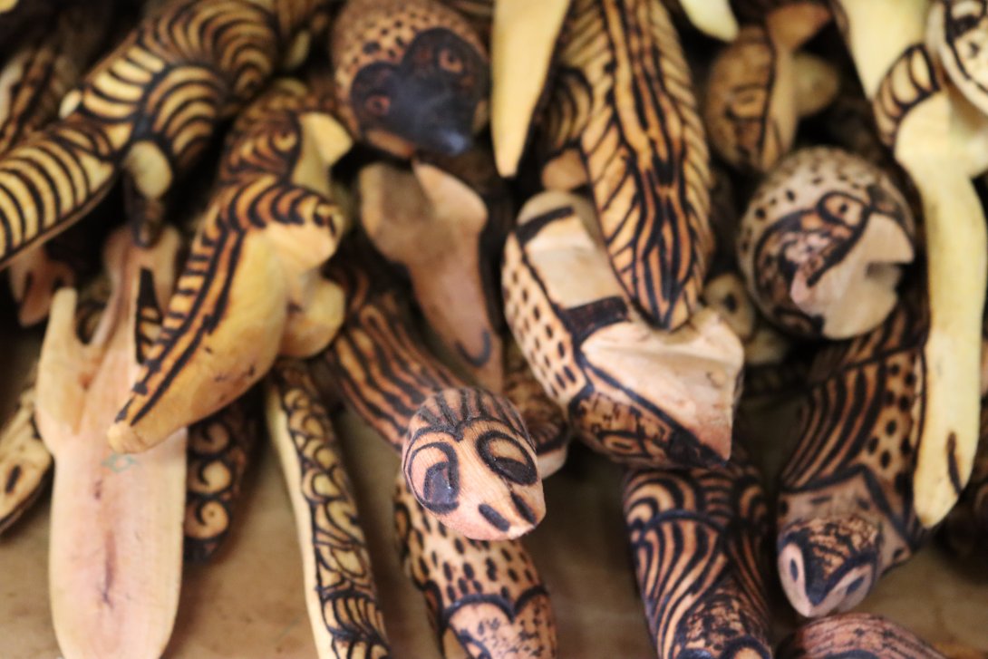 Close up photograph of carved wooden objects