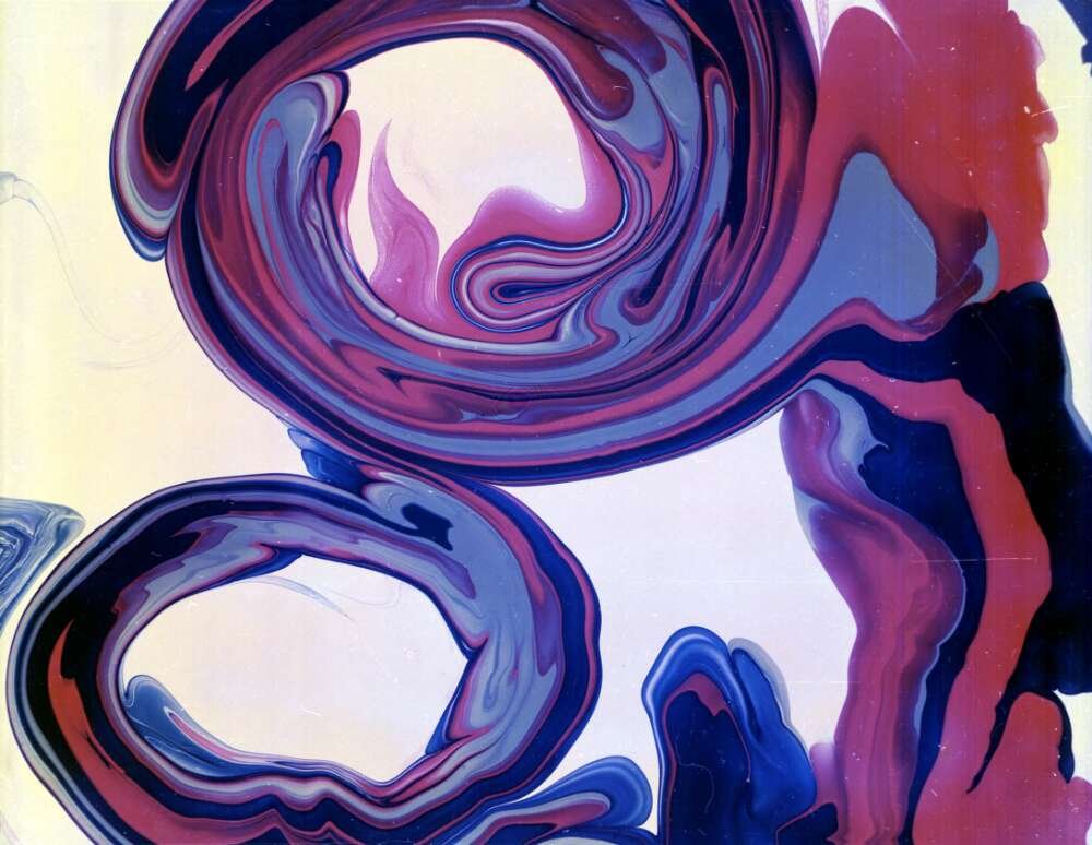 Swirls of paint in blue and purple