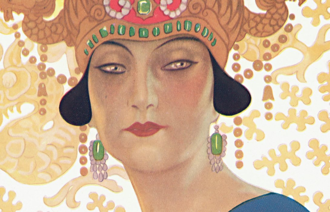 Illustration of a woman with short black hair stares directly out of the illustration. She is wearing a golden headdress with red and green jewels on it and dangly green jewel earrings.