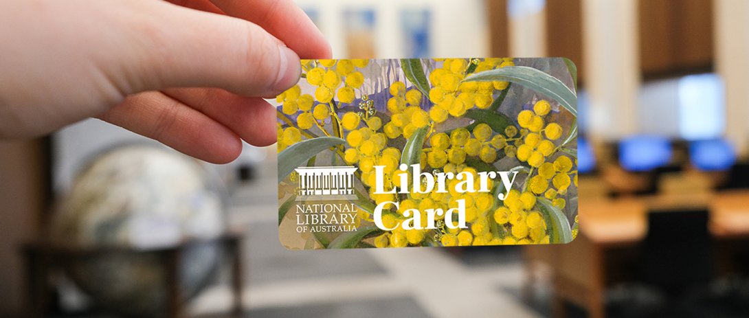 Hand holding a National Library card