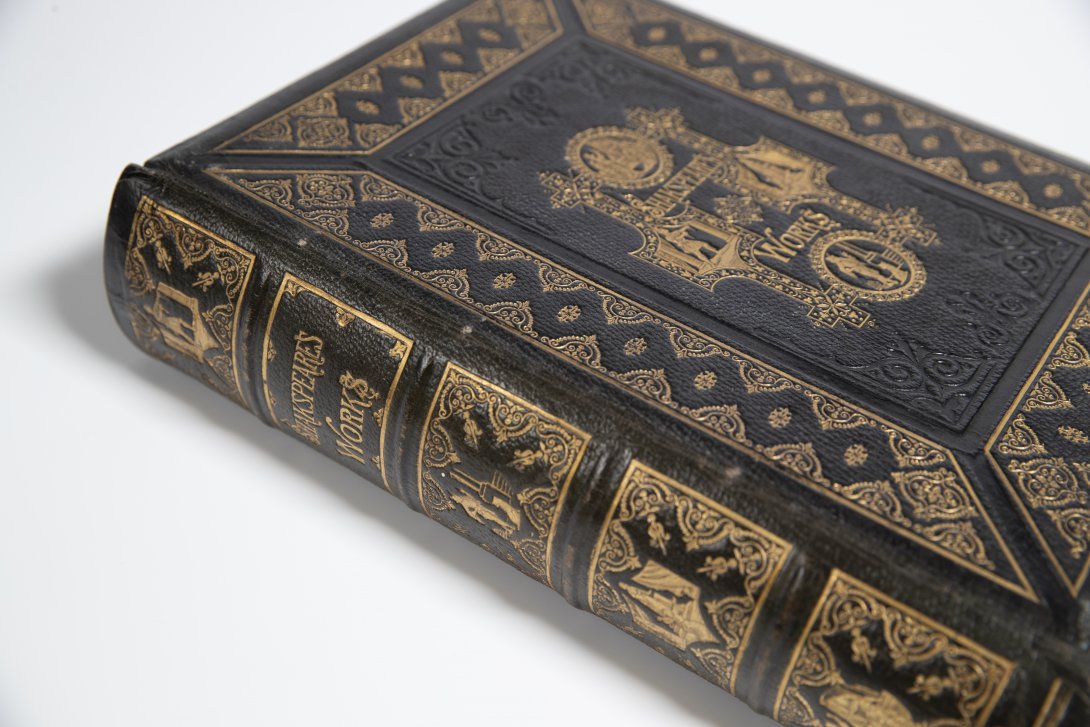 Large black and gold book