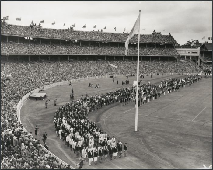 Black and white photo of athletes marching during the closing ceremony of the 1956 Melbourne Olympics