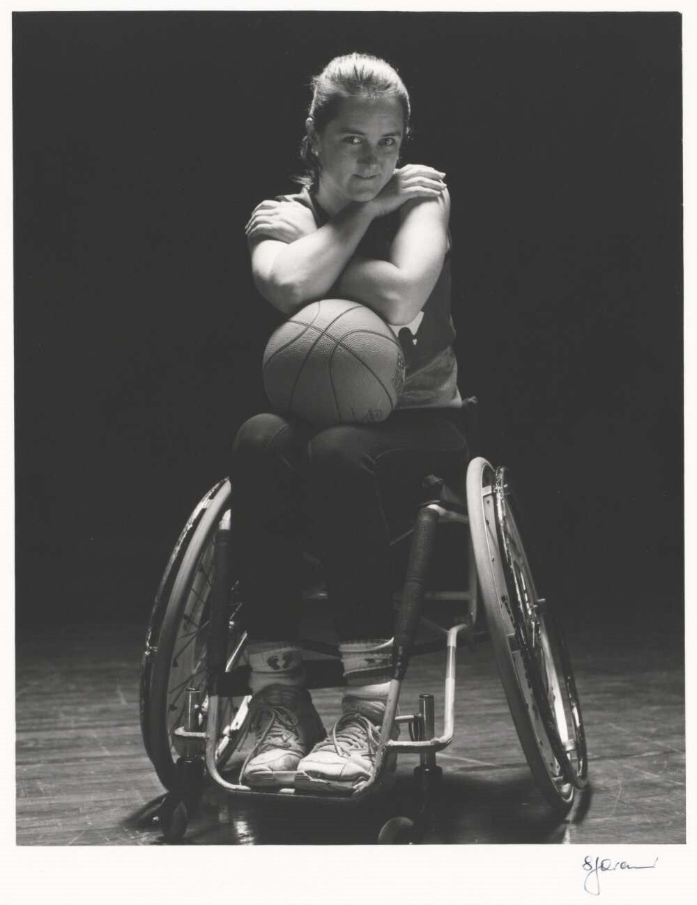 photograph of female wheelchair basketball player