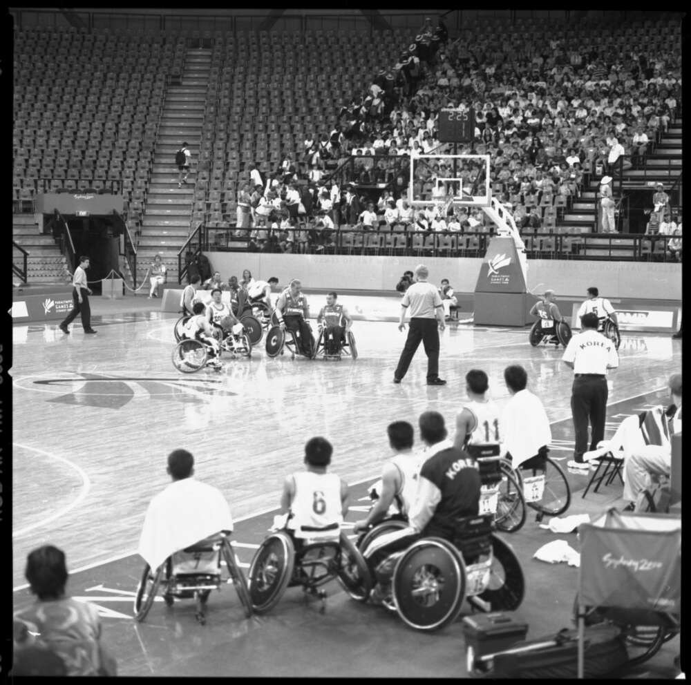 A game of wheelchair basketball at Sydney olympics