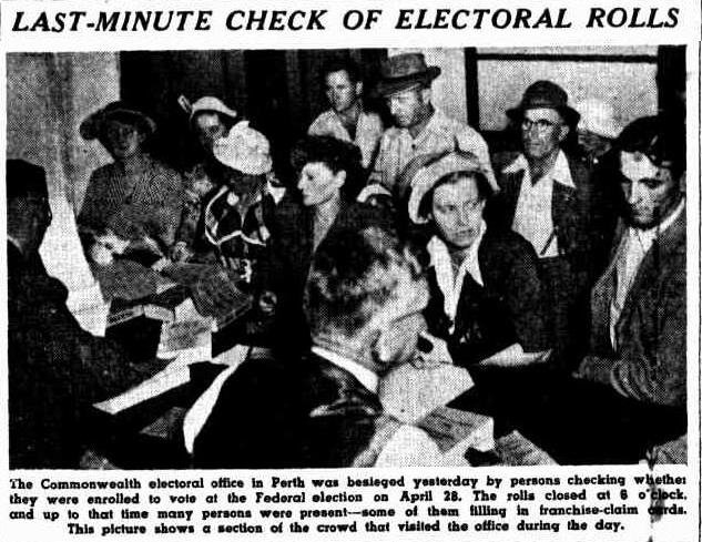 Newspaper article titled 'LAST-MINUE CHECK OF ELECTORAL ROLLS' with photograph of people sitting and looking a bit impatient