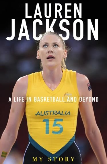 Blonde woman wearing yellow, green and black basketball uniform with 'AUSTRALIA 15' on the front looking up. Large white text above her head reads 'LAUREN JACKSON'. Smaller text in the middle reads 'A LIFE IN BASKETBALL AND BEYOND'. More small text at the bottom reads 'MY STORY'