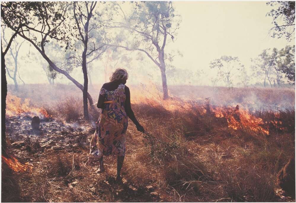 Leunig, Helga. The artist Gertie Huddlestone cleaning up country with controlled burning, Arnhem Land, 1992 : , .