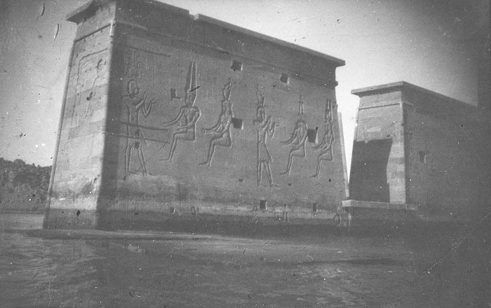 A grainy, black and white photograph of the partly submerged Temple of Isis in Egypt.